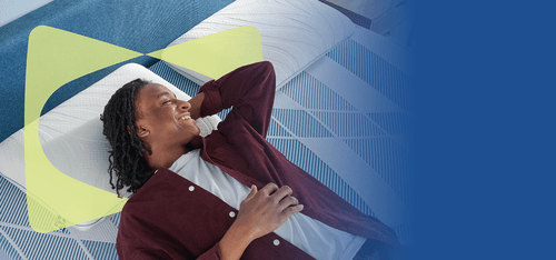 Man laying on DreamLife mattress with butterfly frame