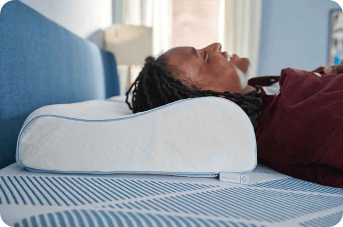 Man laying on Dreamlife pillow