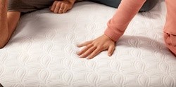 Hand on Cocoon Mattress