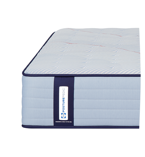 Posturepedic Spring mattress corner view showing label with rounded corners