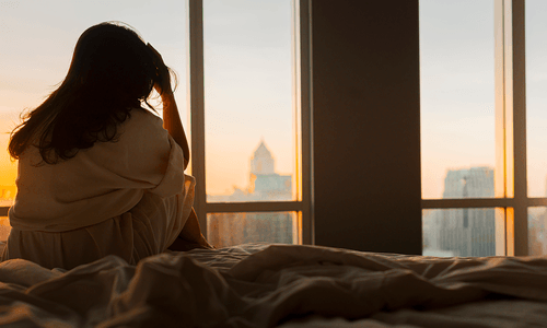 Woman with Head in Hands